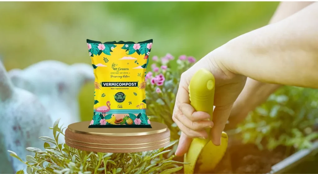 Hand using a gardening tool while a vermicompost fertilizer bag is displayed in a lush green garden setting